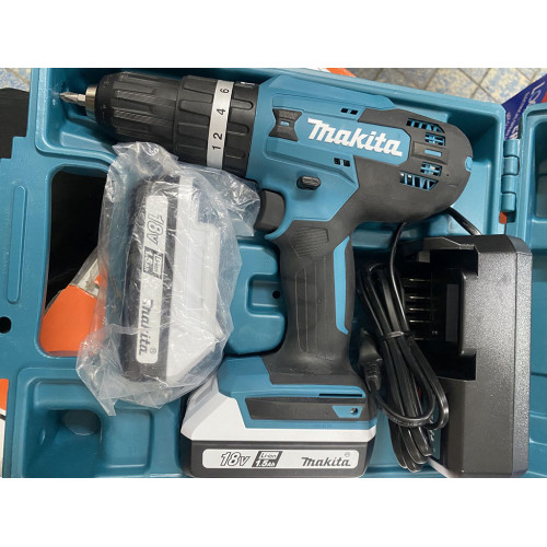 Makita HP488DWE Perceuse visseuse a percussion 2x akku 18V/1,5Ah